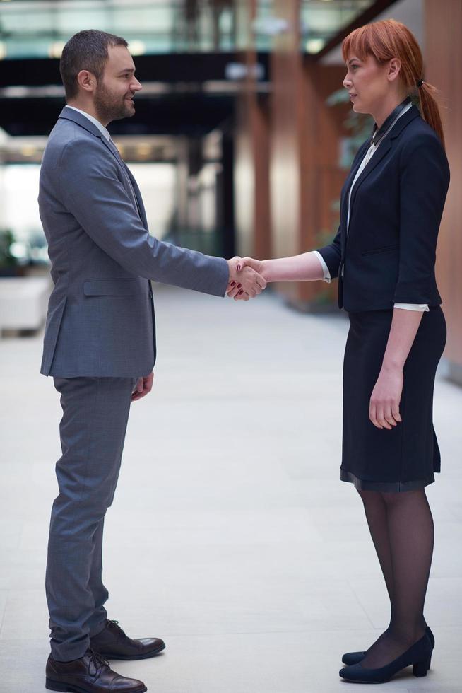 business man and woman hand shake photo