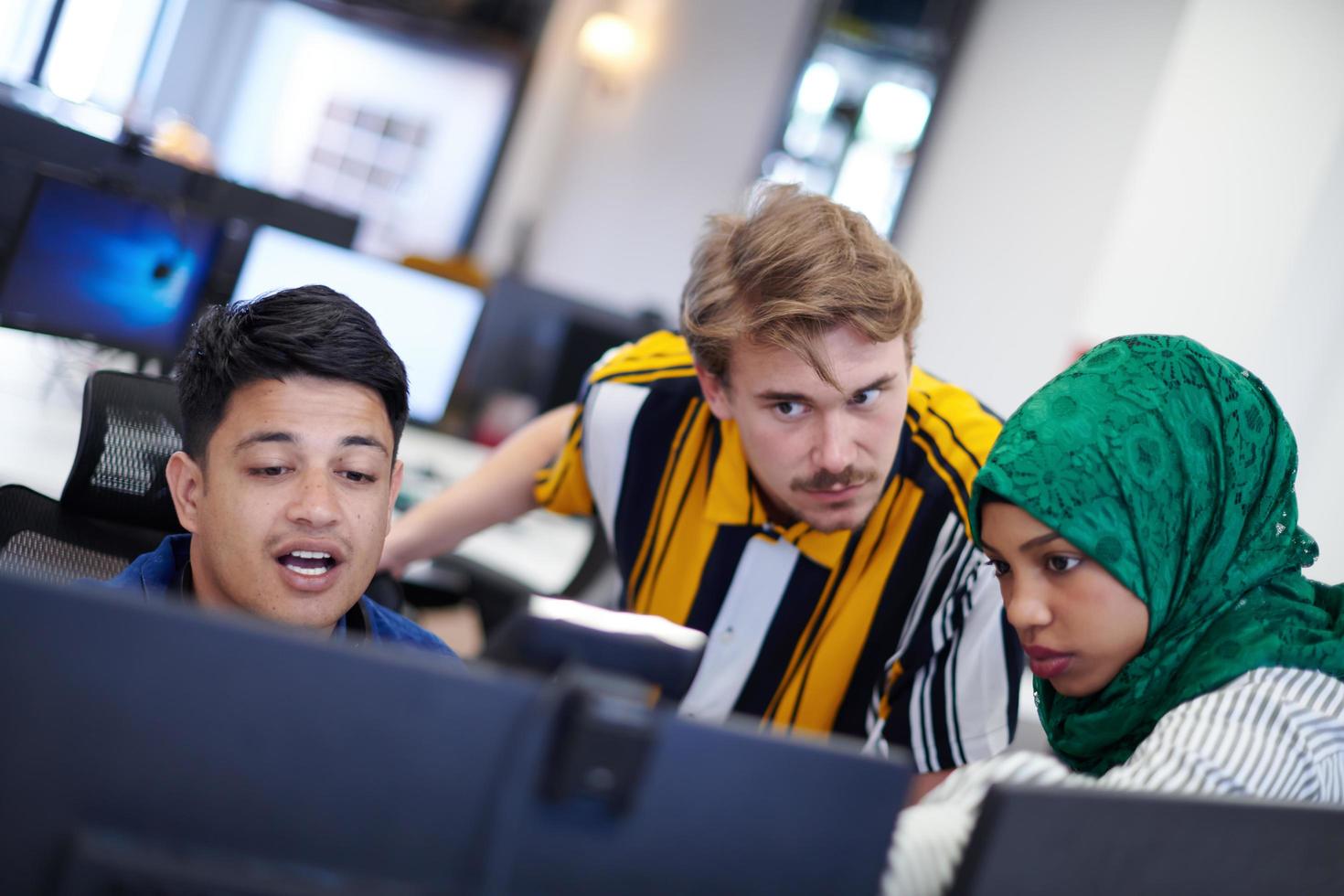 Multiethnic startup business team with Arabian woman photo