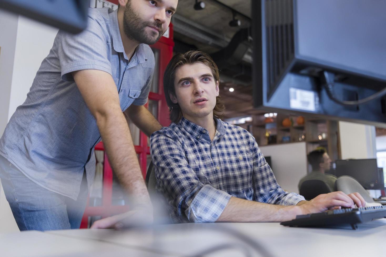 startup business people group working as team to find solution photo