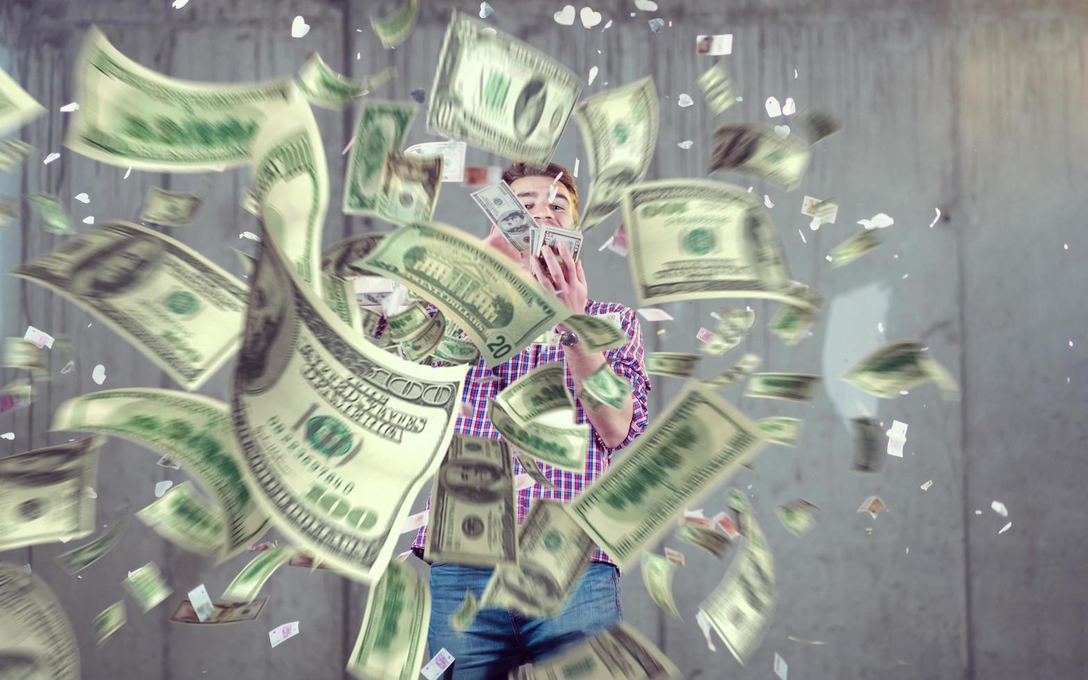 businessman making the rain of money photo