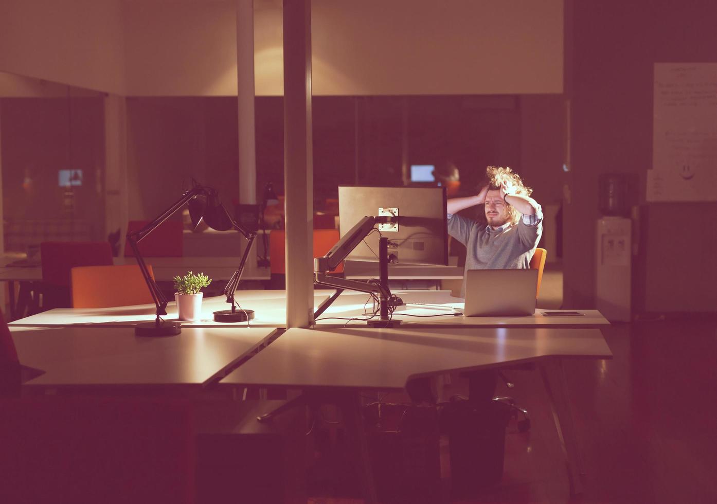 businessman relaxing at the desk photo