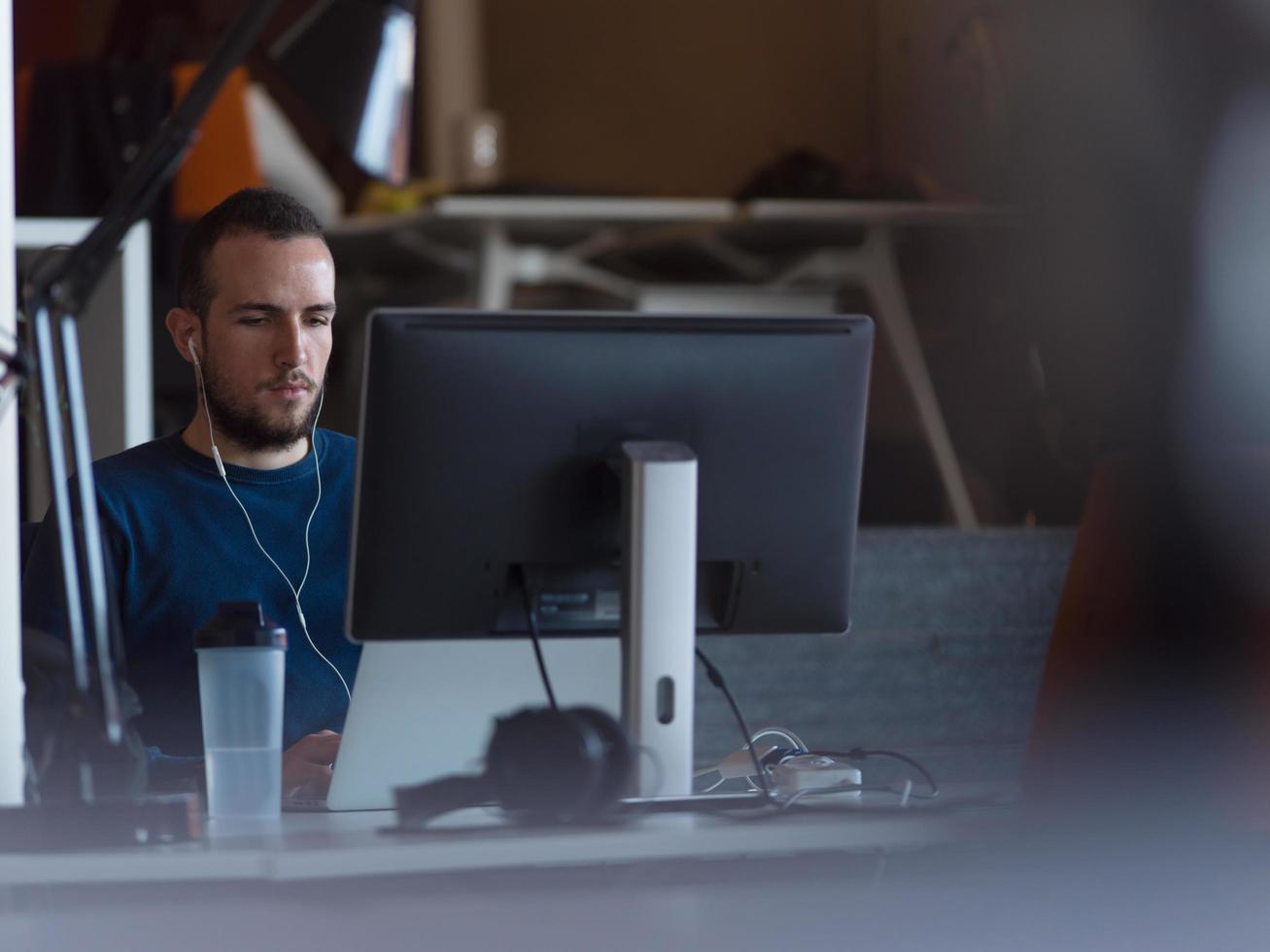 businessman working using a laptop in startup office photo
