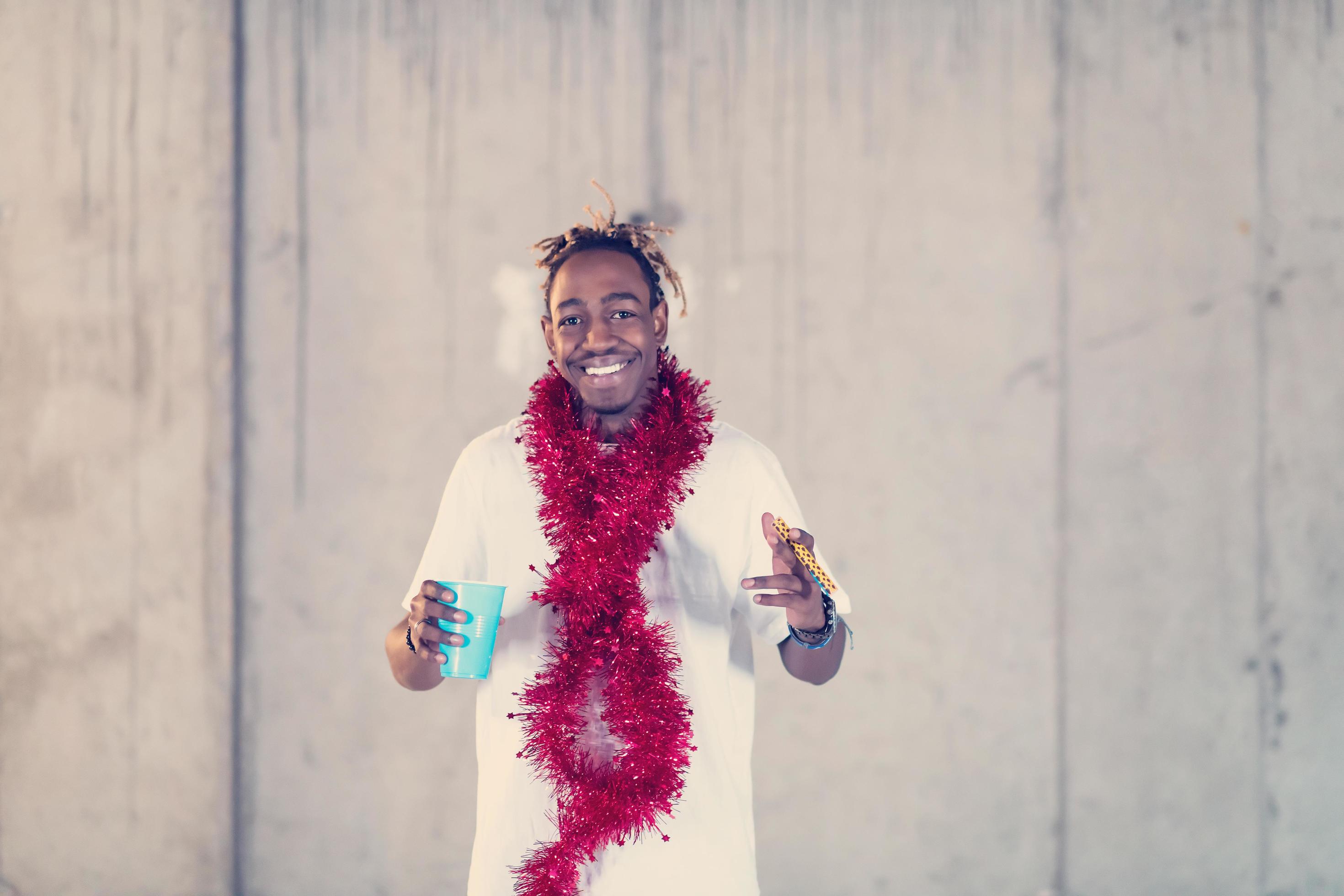 young black business man celebrating new years party 12441353 Stock