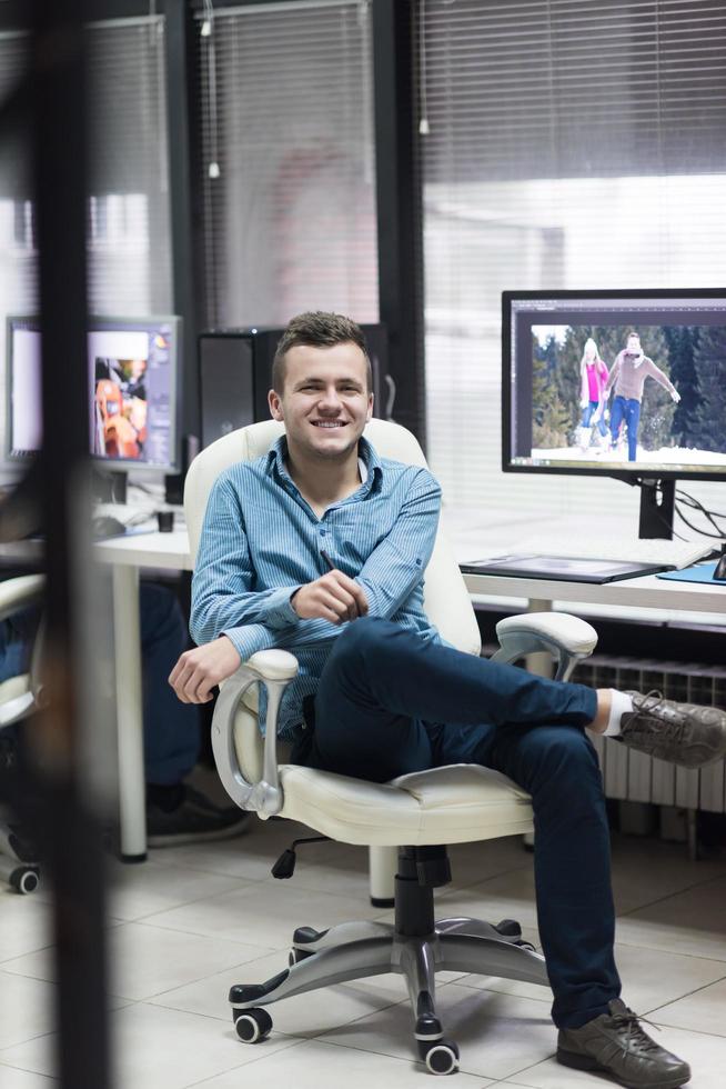 photo editor at his desk