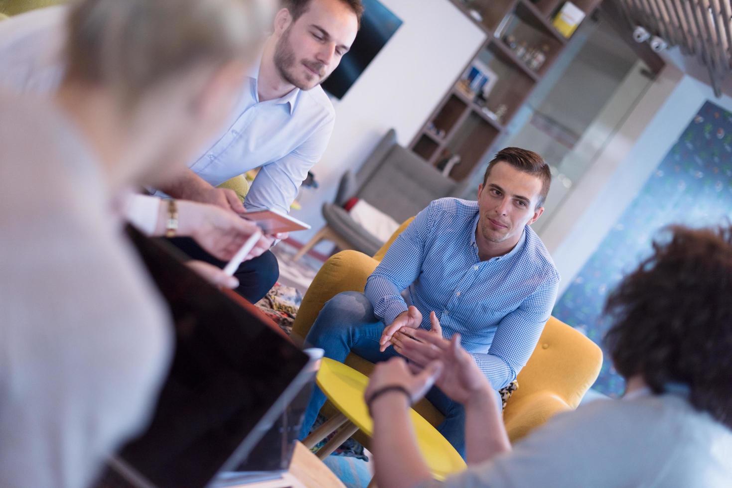 Startup Business Team At A Meeting at modern office building photo