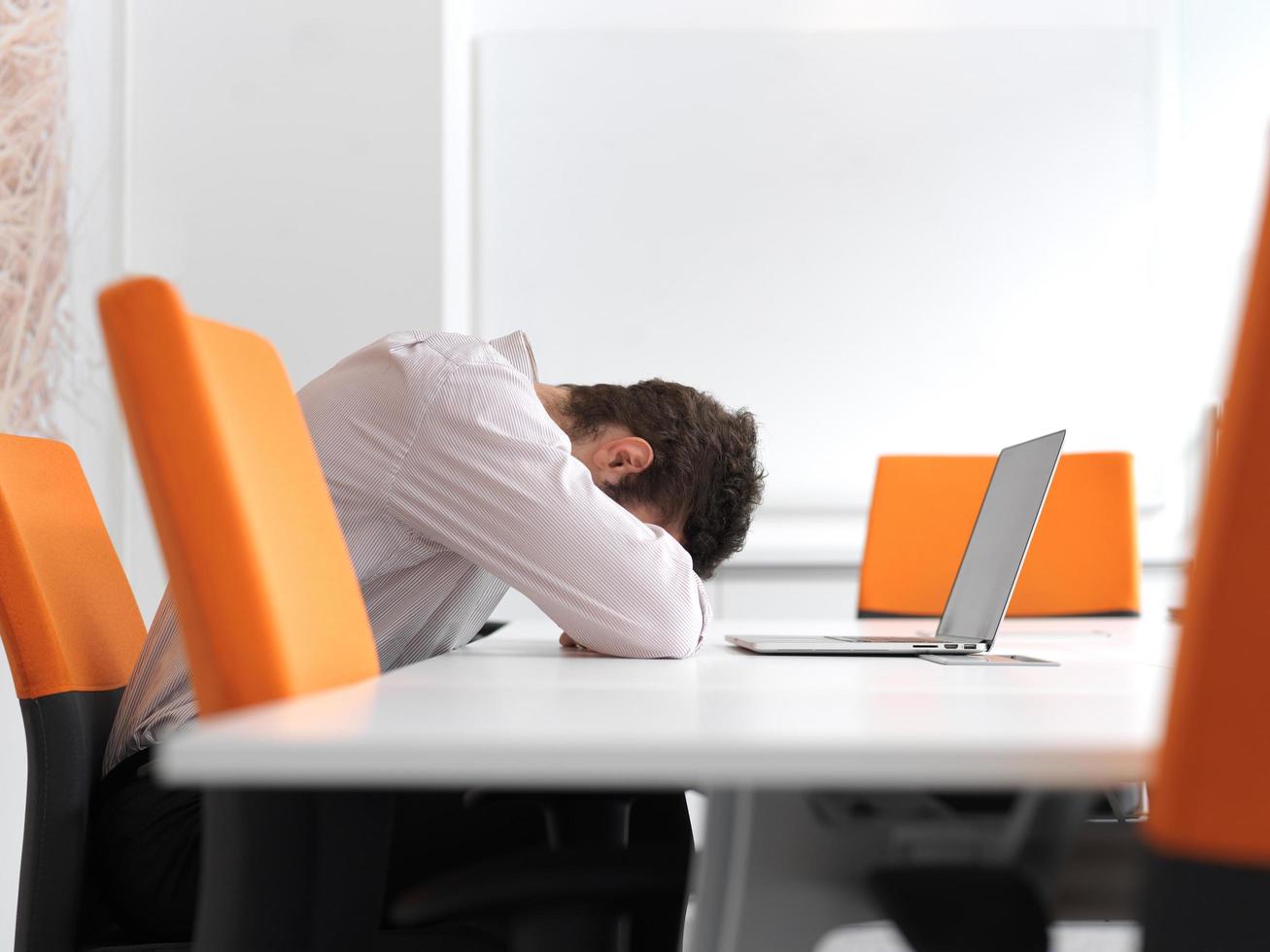 frustrated young business man at office photo