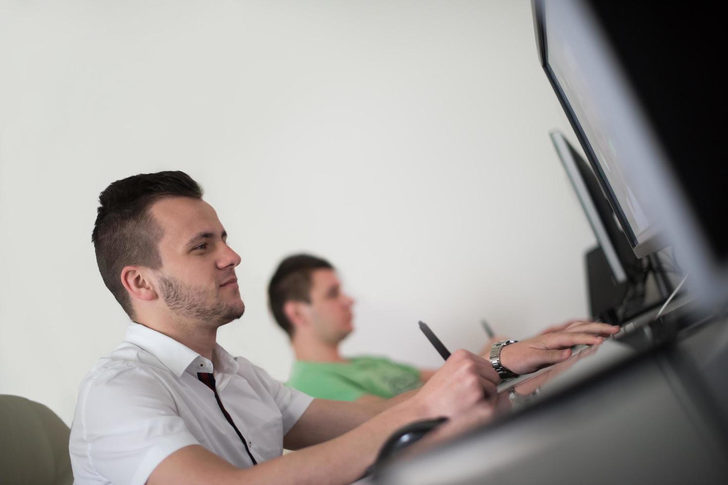 a group of graphic designers at work photo