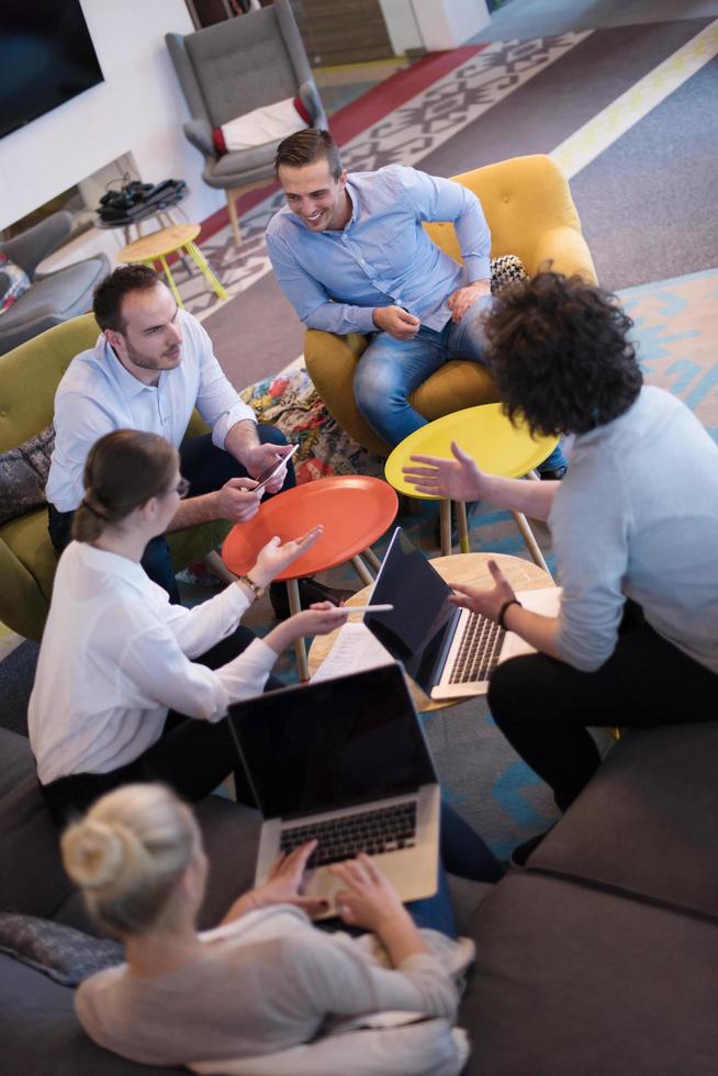 Startup Business Team At A Meeting at modern office building photo
