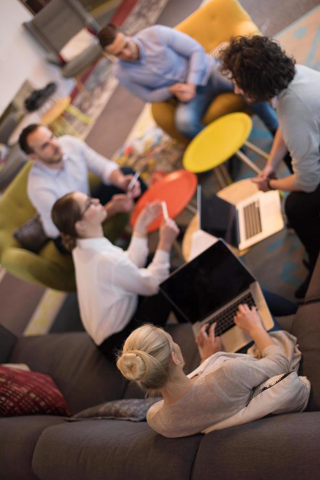 Startup Business Team At A Meeting at modern office building photo