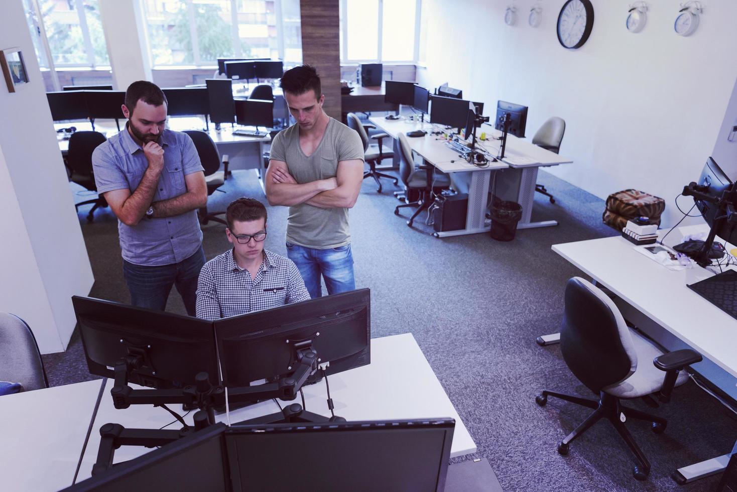 startup business people group working as team to find solution photo