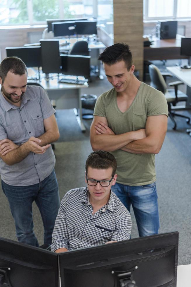 startup business people group working as team to find solution photo