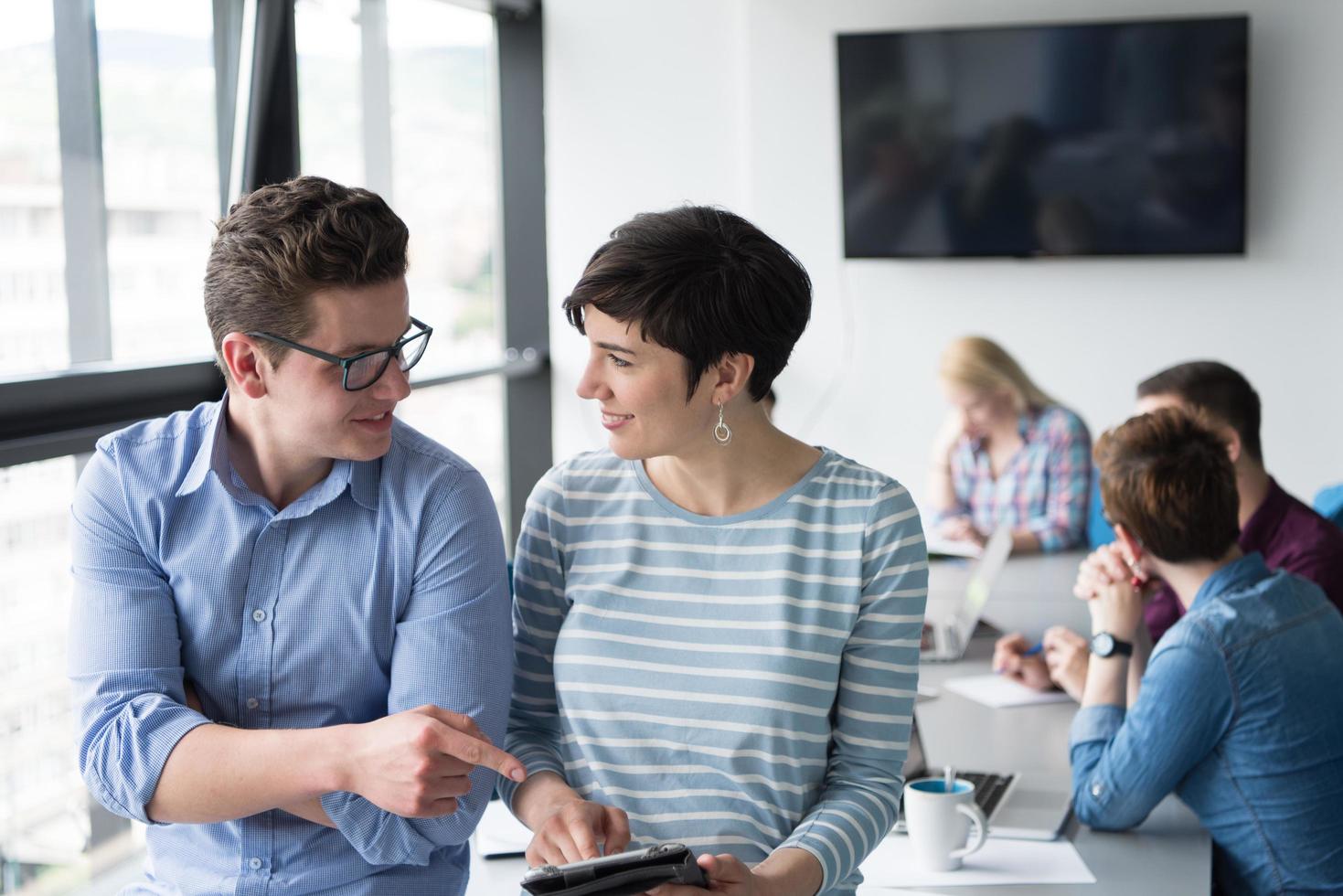 business People Working With Tablet in office photo