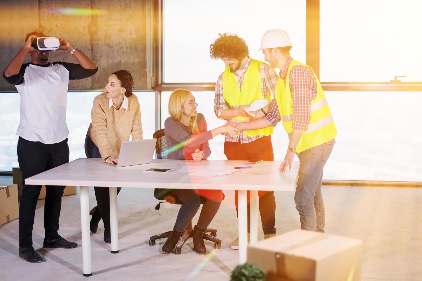 group of multiethnic business people on construction site photo