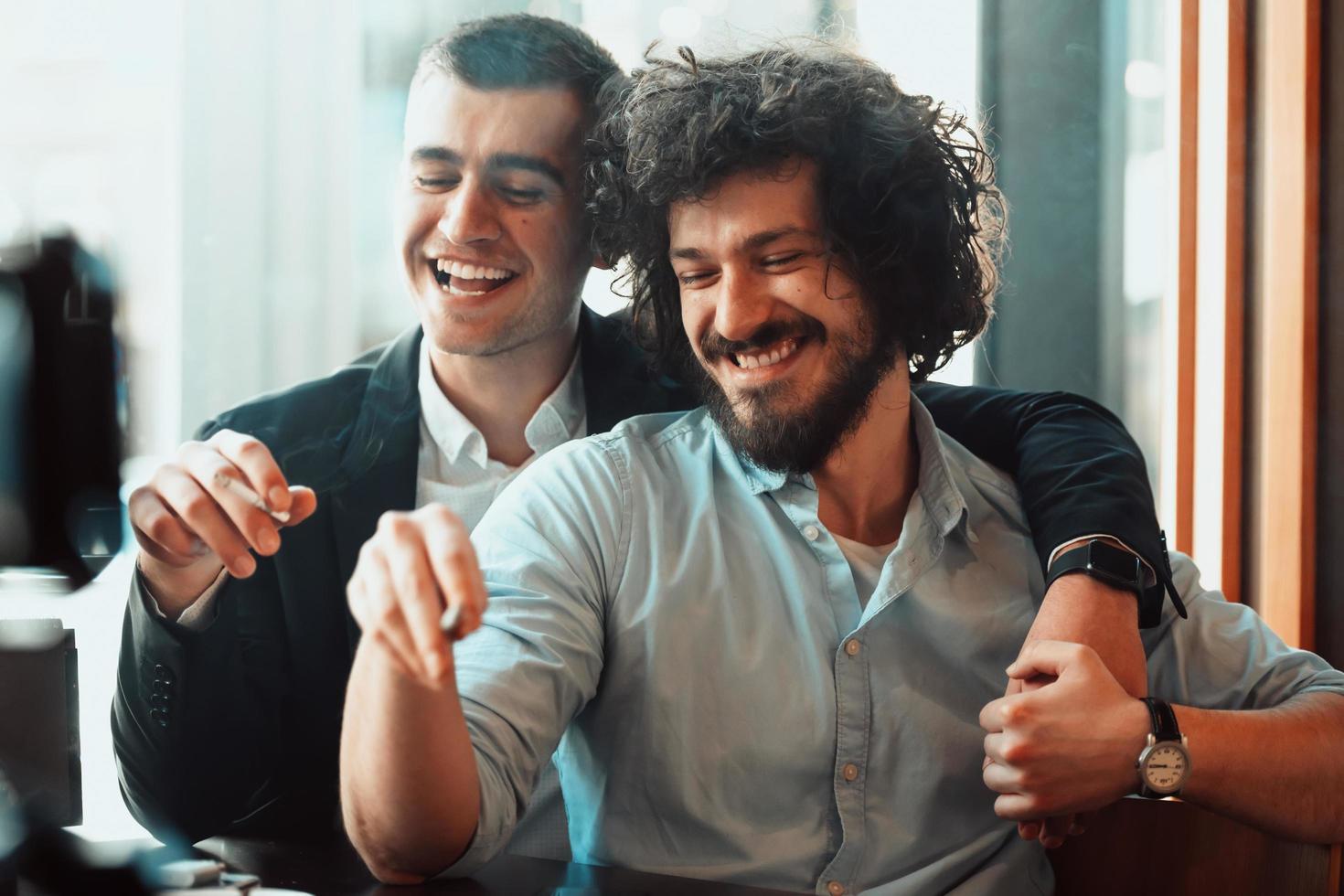 Portrait of multiethnic diverse gay LGBT romantic male couple embracing and showing their love photo