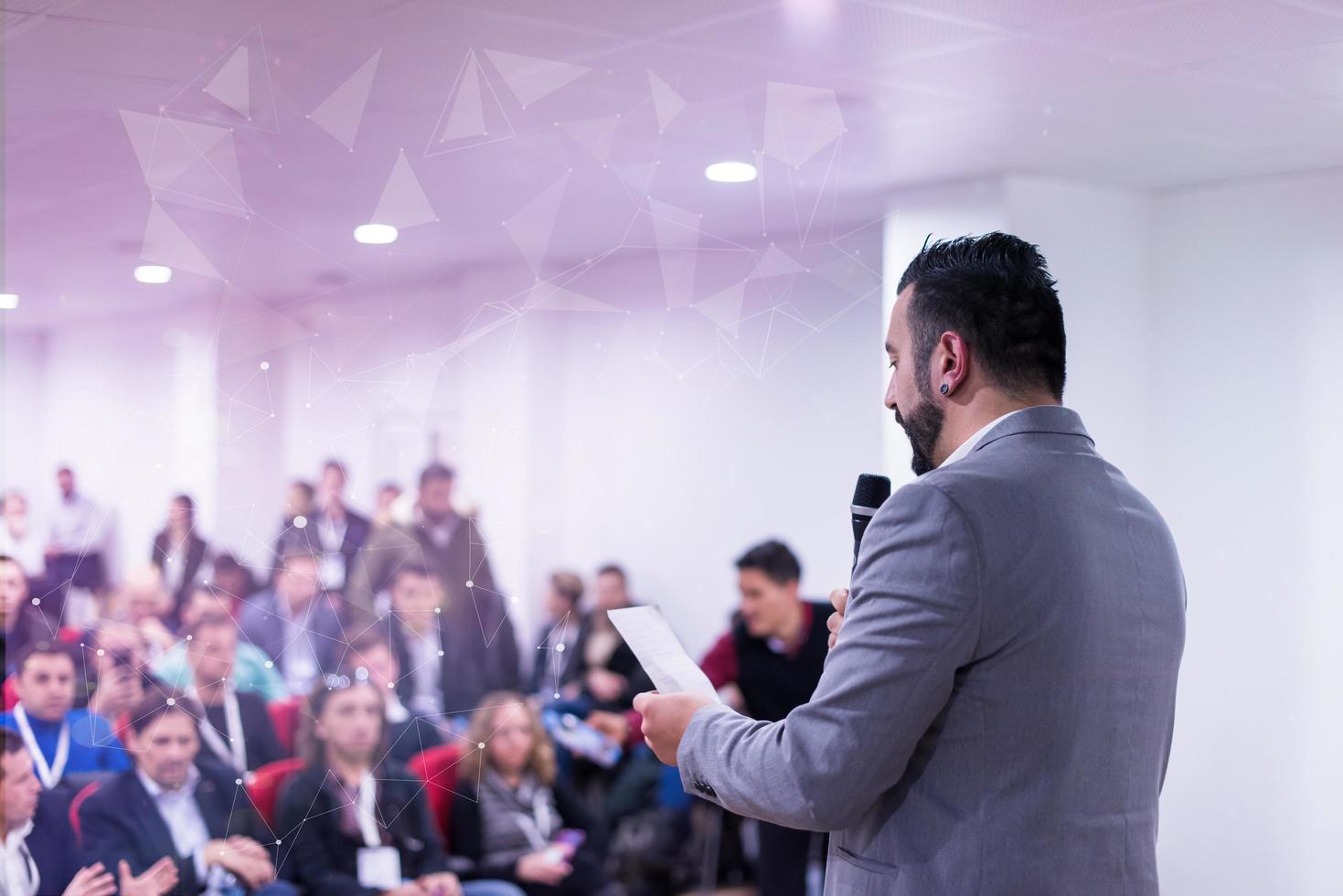 successful businessman giving presentations at conference room photo