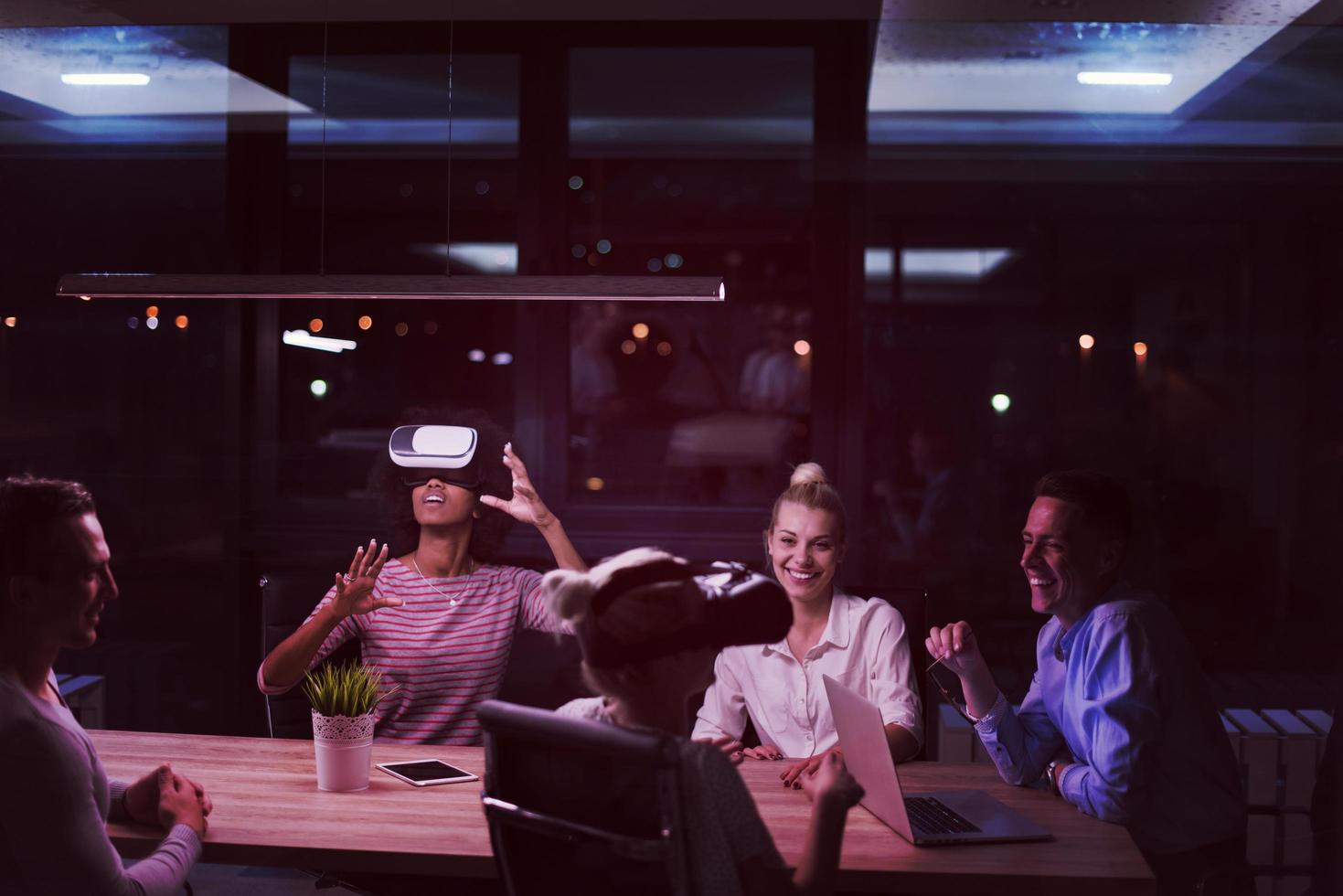 Multiethnic Business team using virtual reality headset photo