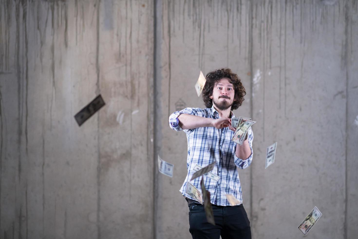 businessman making the rain of money photo