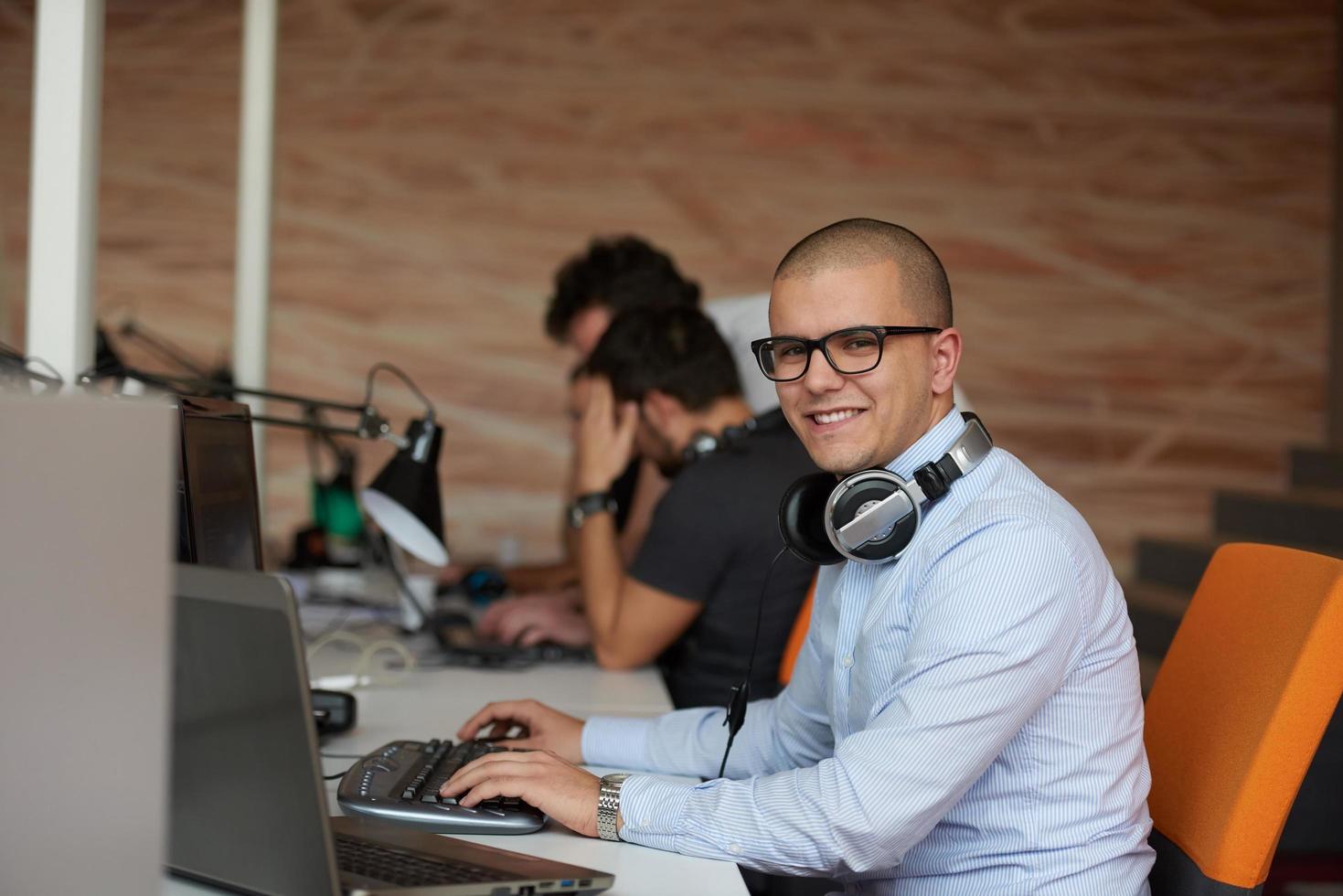 startup business, software developer working on computer photo