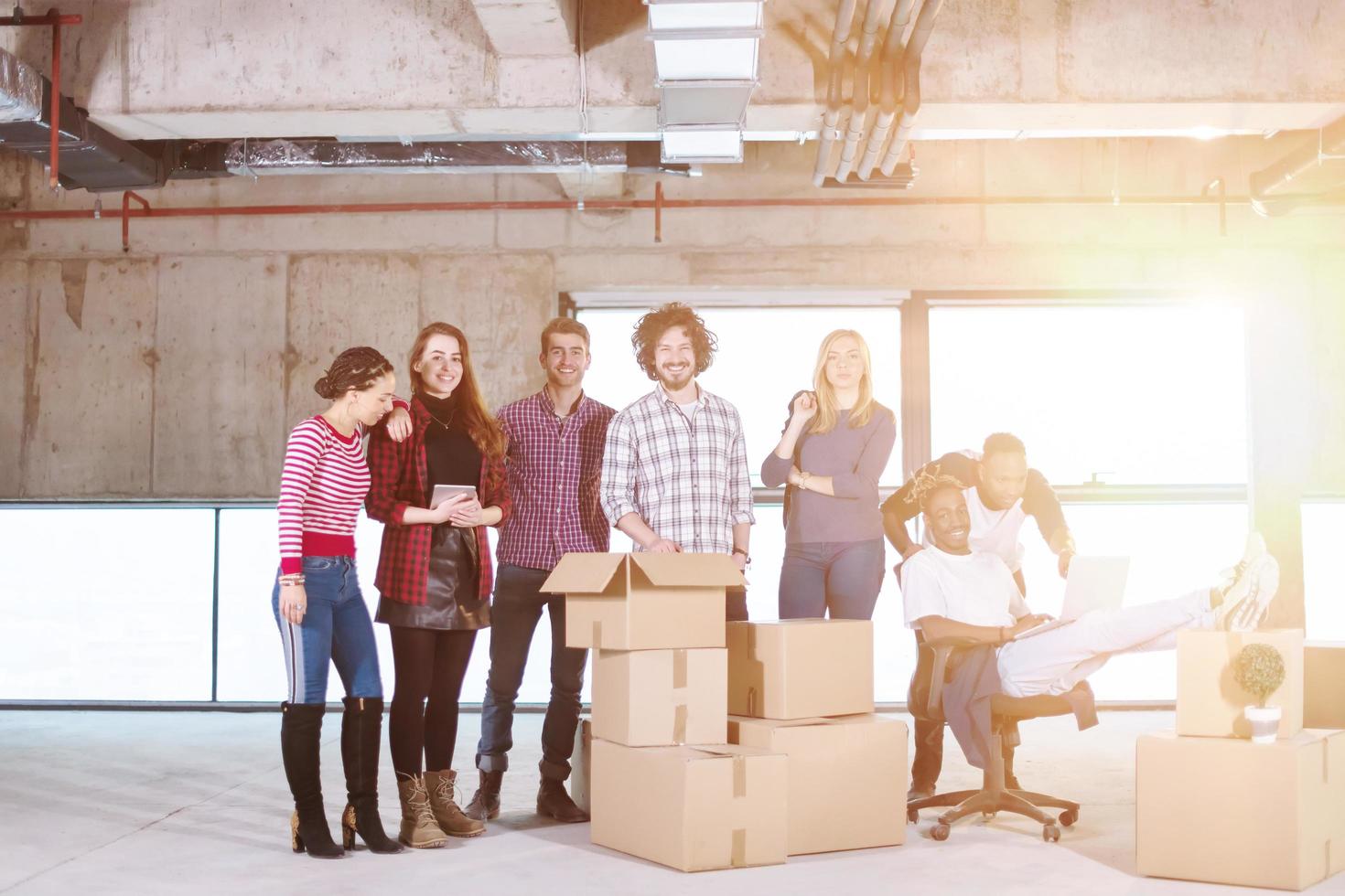portrait of multiethnic business people with sunlight through the windows photo