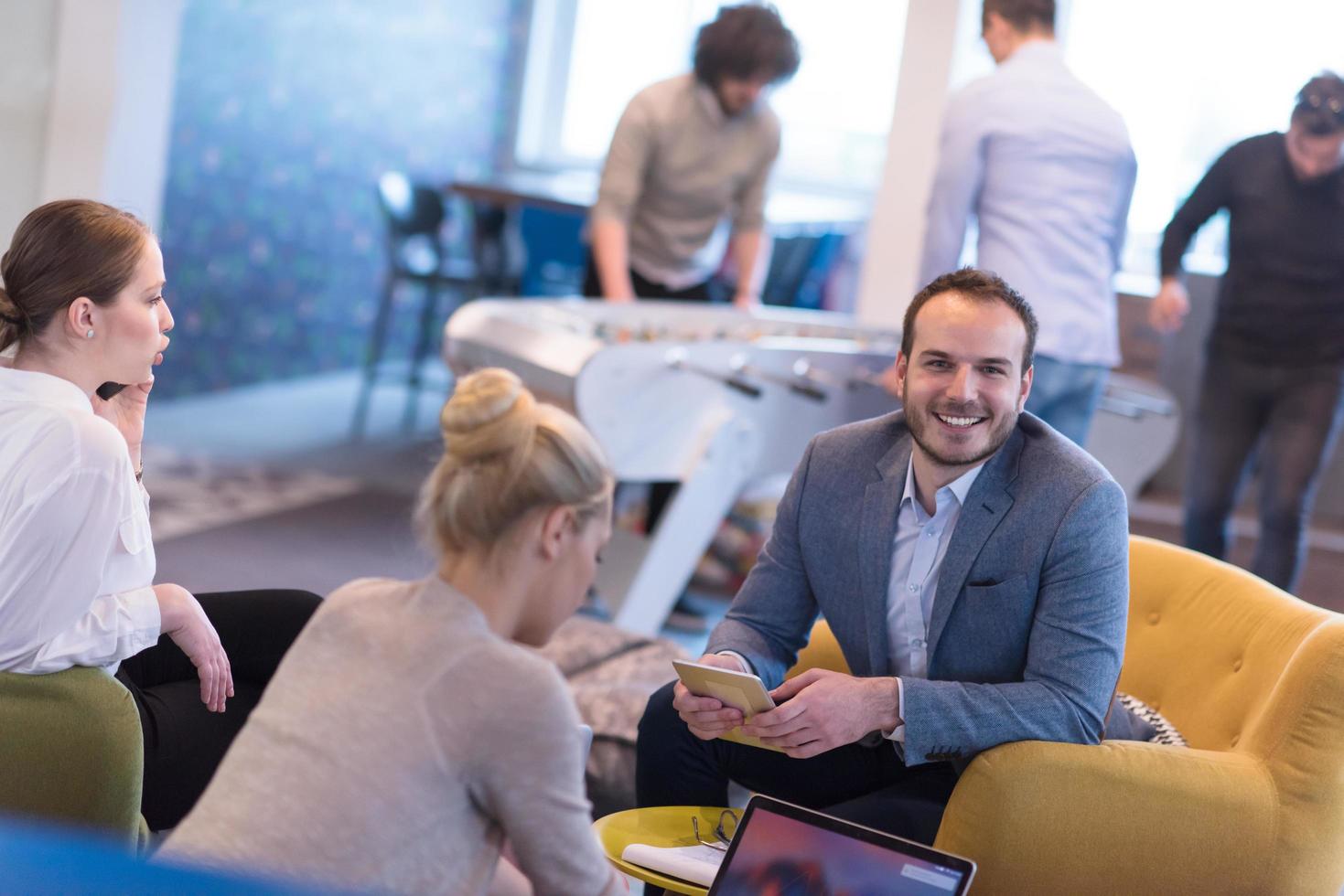 Startup Business Team At A Meeting at modern office building photo