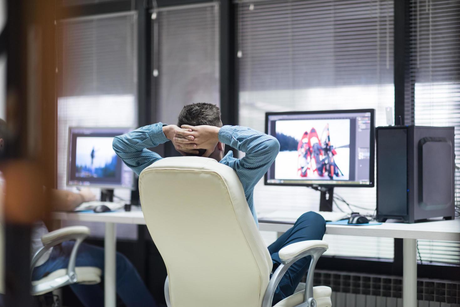 photo editor at his desk