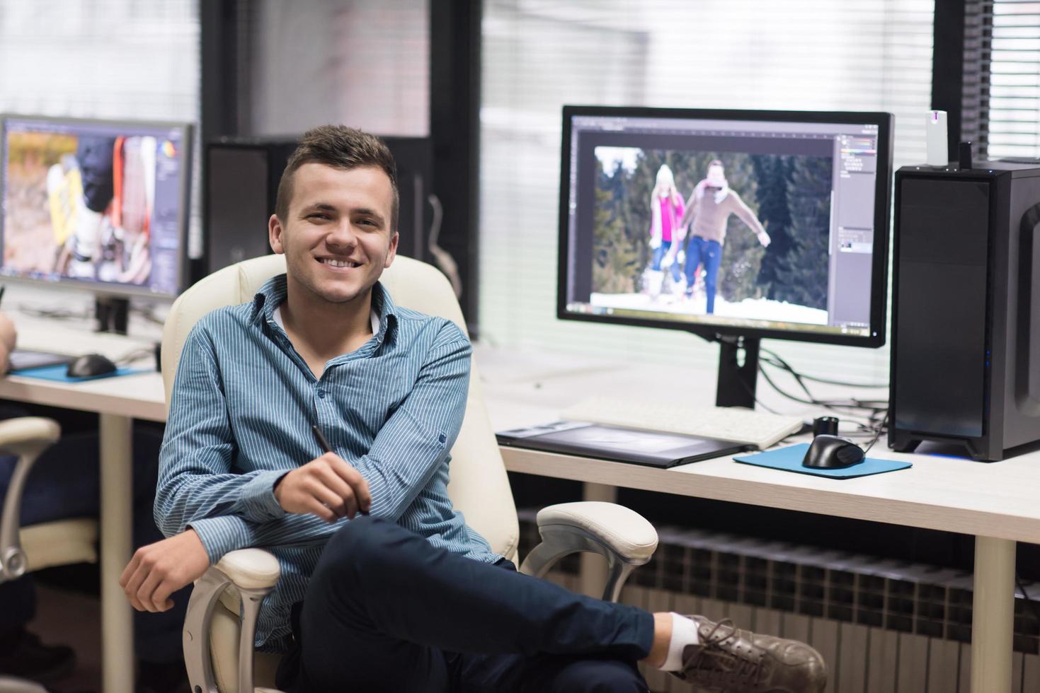 photo editor at his desk