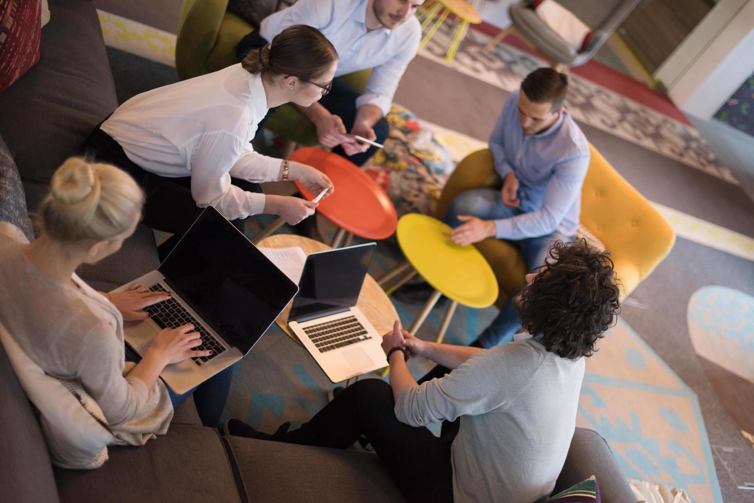 Startup Business Team At A Meeting at modern office building photo