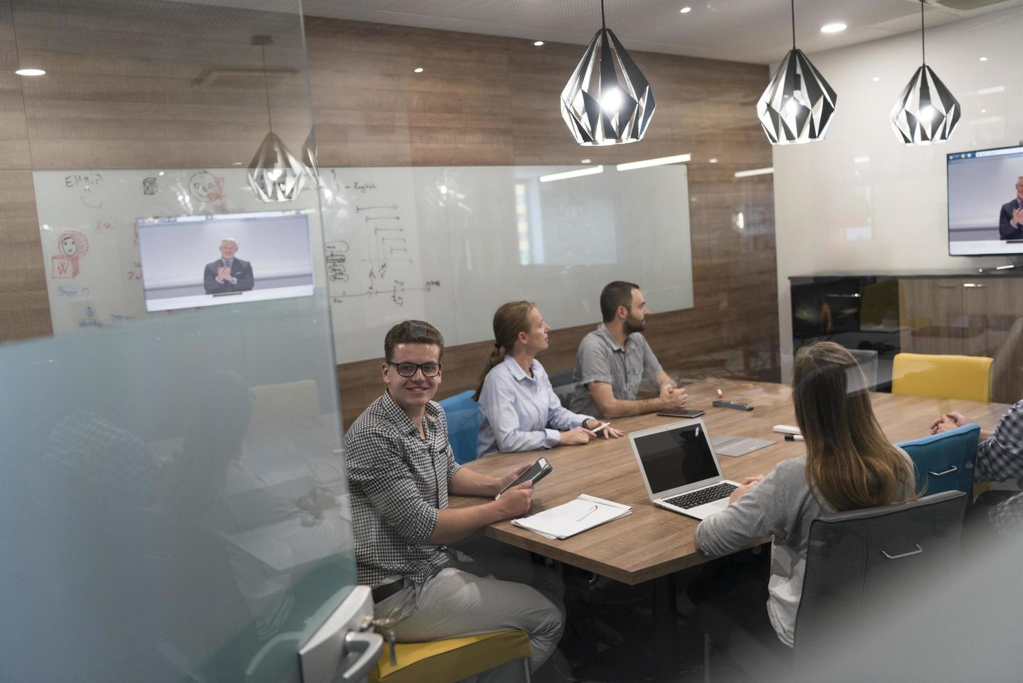 start up business people group attending videoconference call photo