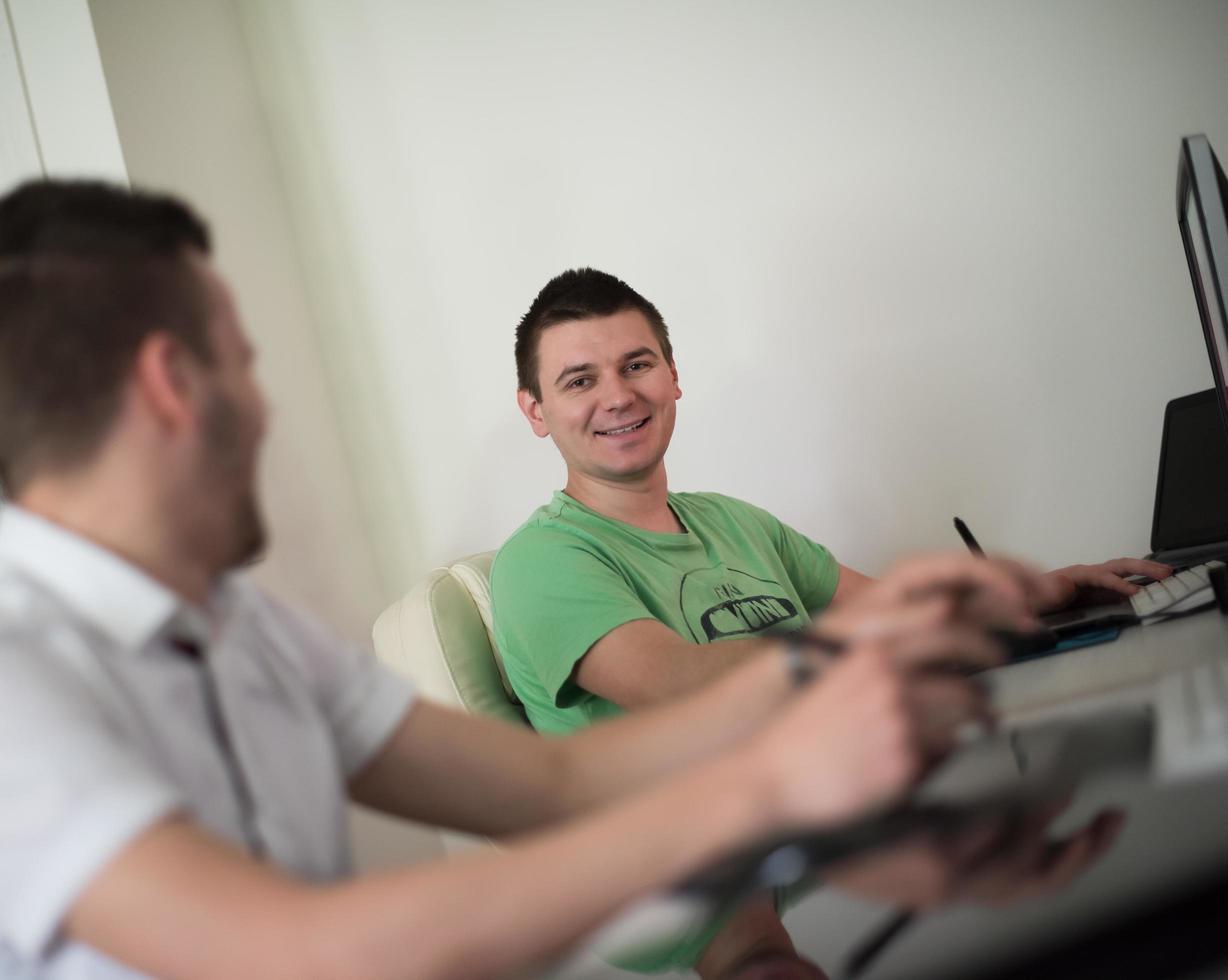 a group of graphic designers at work photo