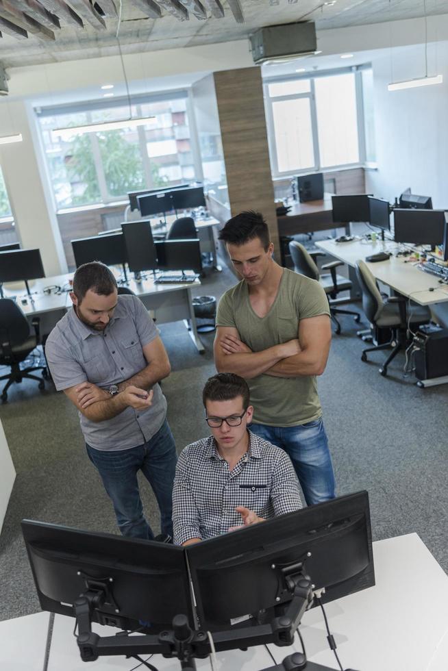 startup business people group working as team to find solution photo