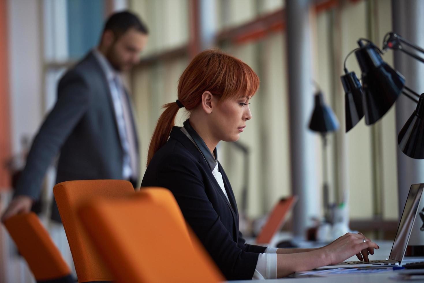 business woman working on computer at office photo