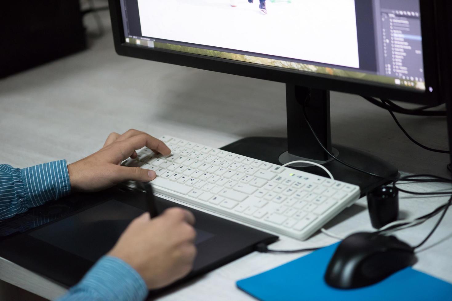 photo editor at his desk
