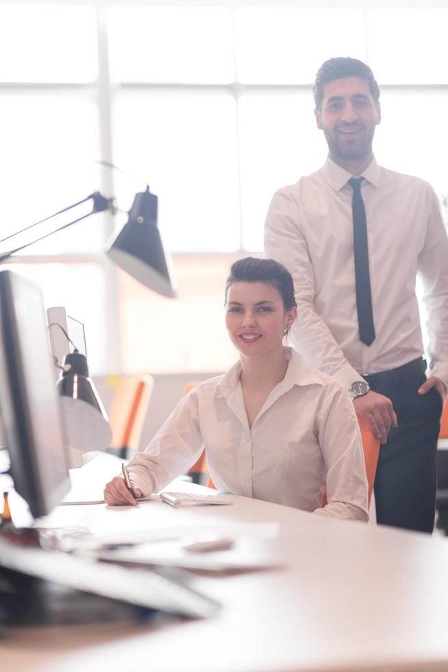 portrait of business couple at office photo