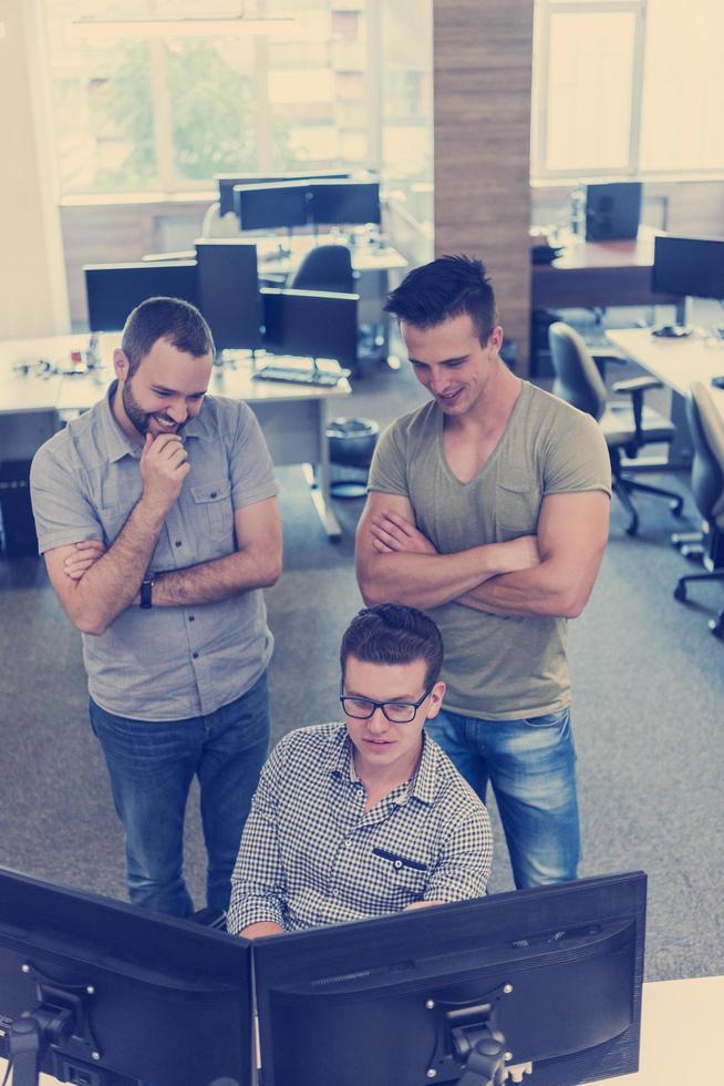startup business people group working as team to find solution photo