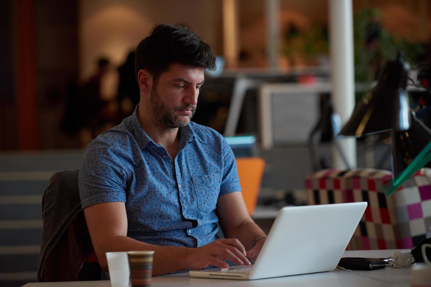 startup business, software developer working on computer photo