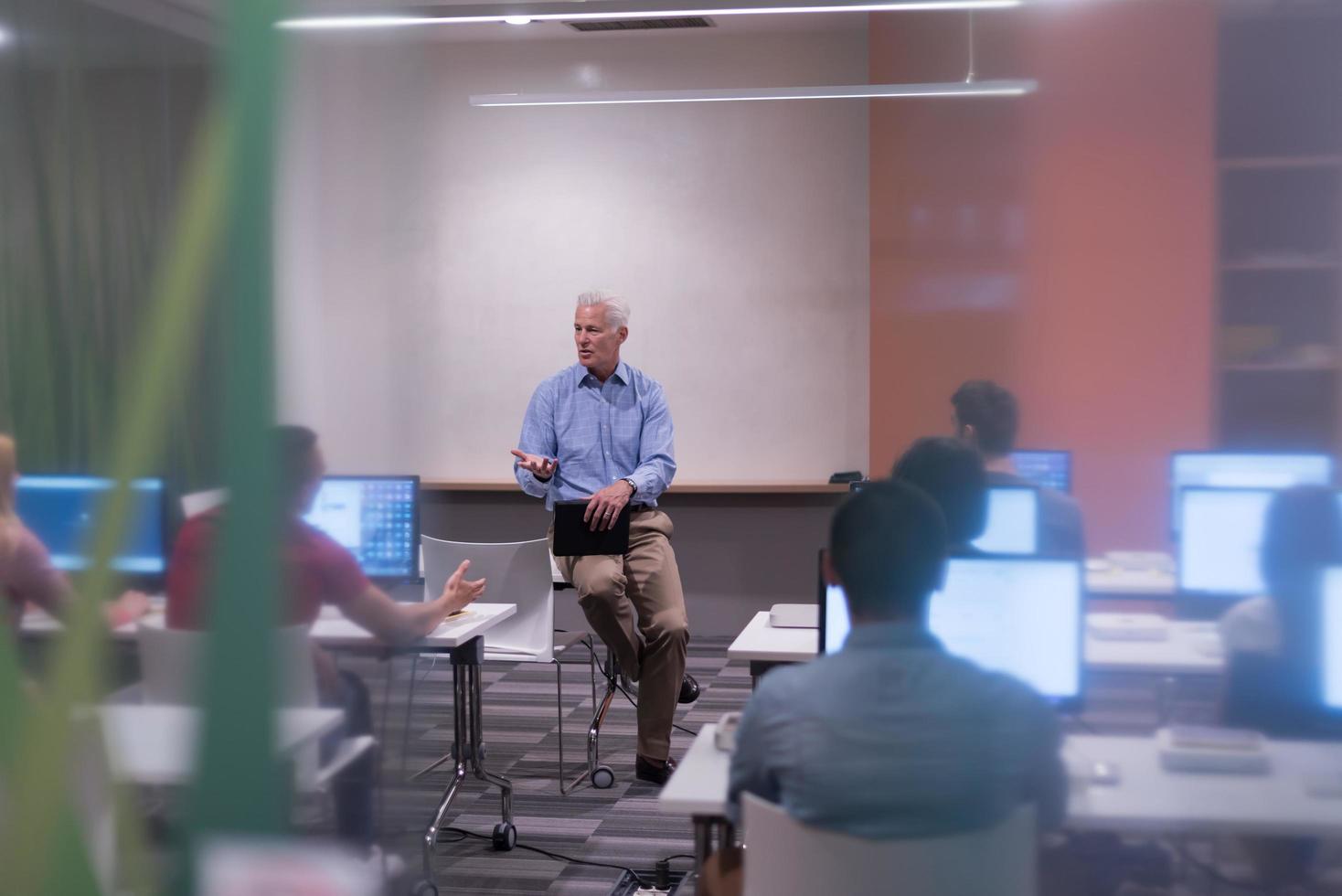 teacher and students in computer lab classroom photo