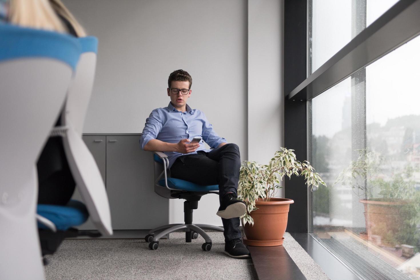 businessman in startup office by the window photo