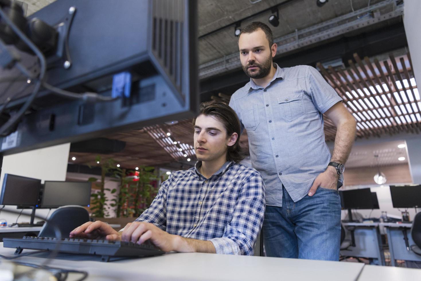 startup business people group working as team to find solution photo