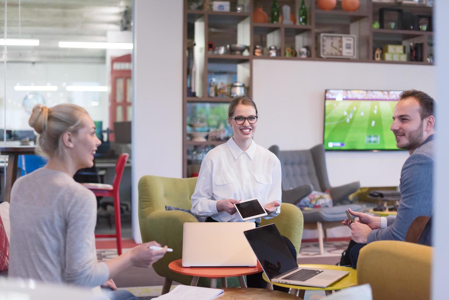 Startup Business Team At A Meeting at modern office building photo