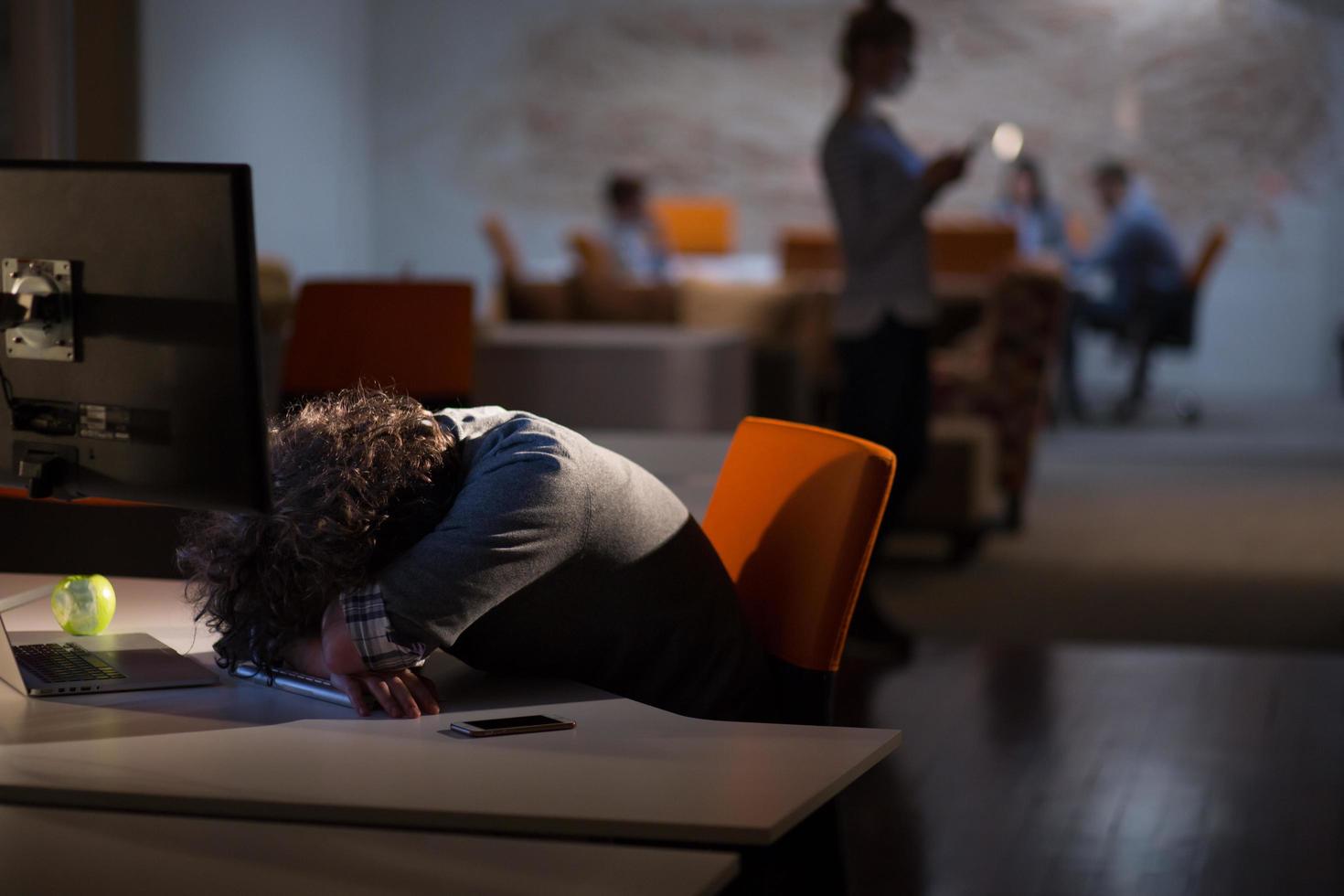 businessman relaxing at the desk photo