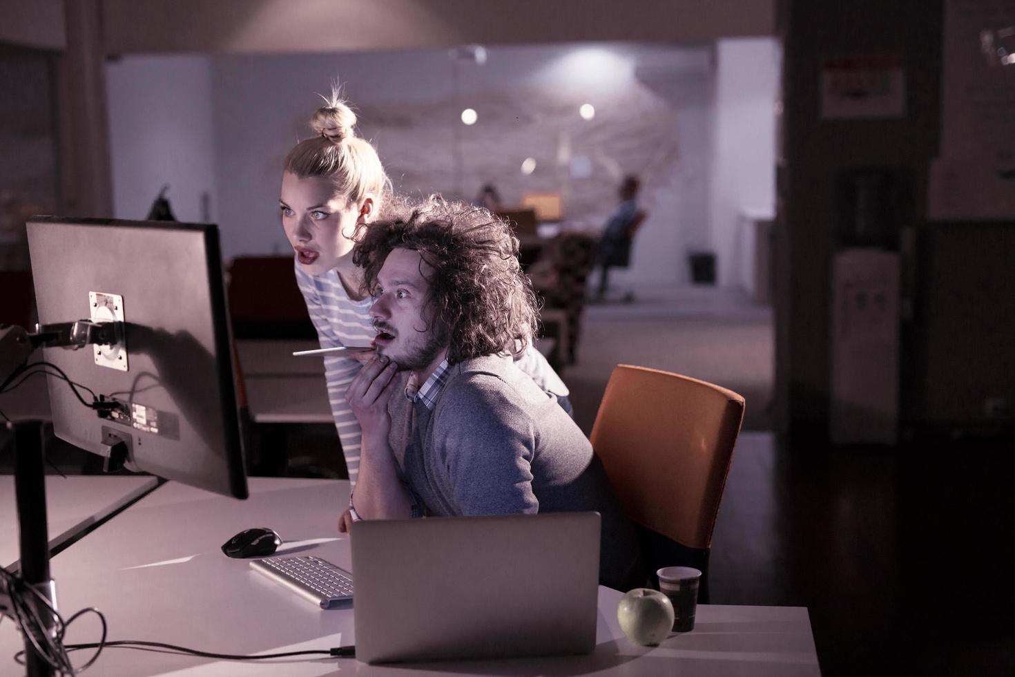 young designers in the night office photo