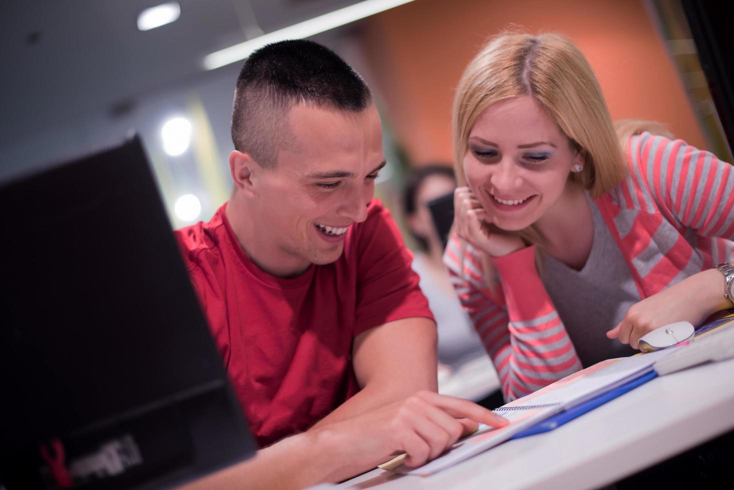 technology students group working  in computer lab school  classroom photo