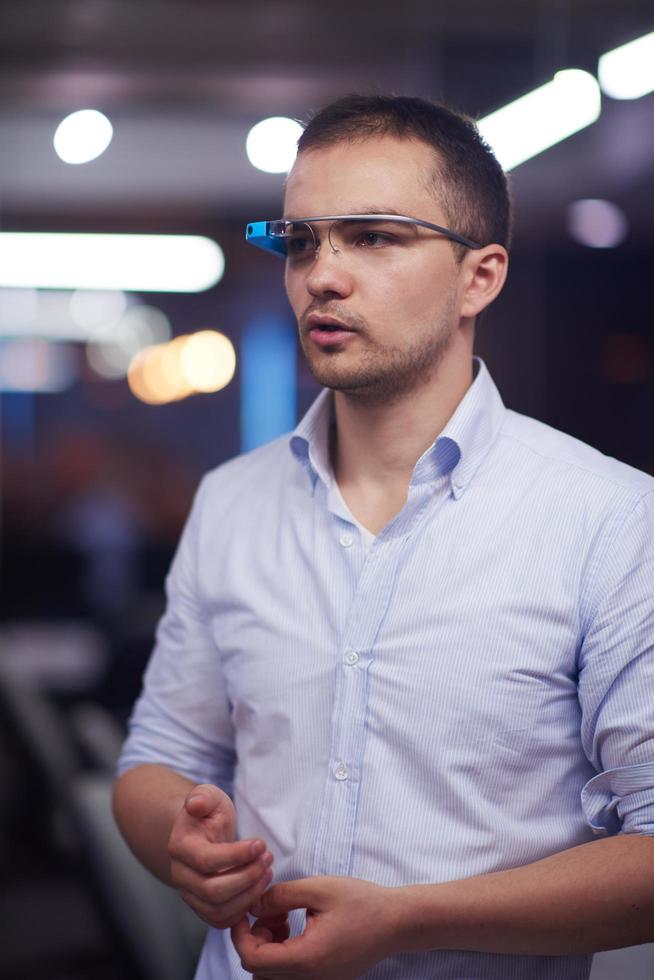 man using virtual reality gadget computer glasses photo