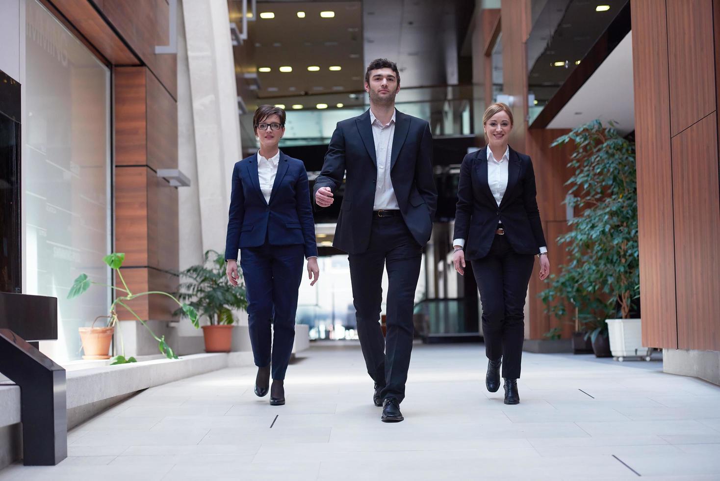 business people team walking photo
