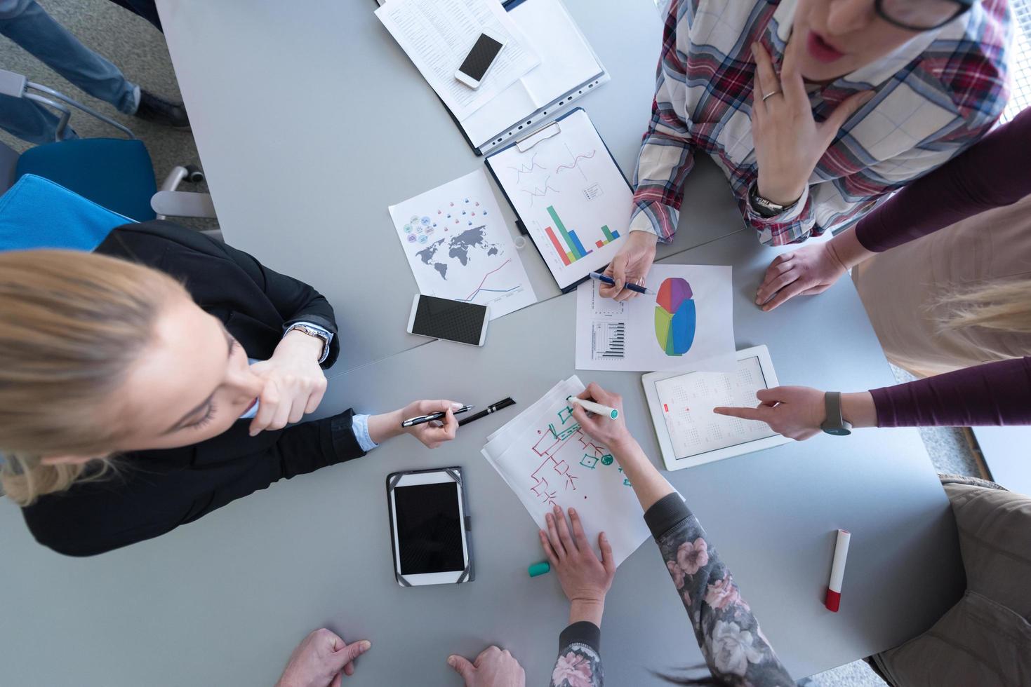 top  view of business people group brainstorming on meeting photo