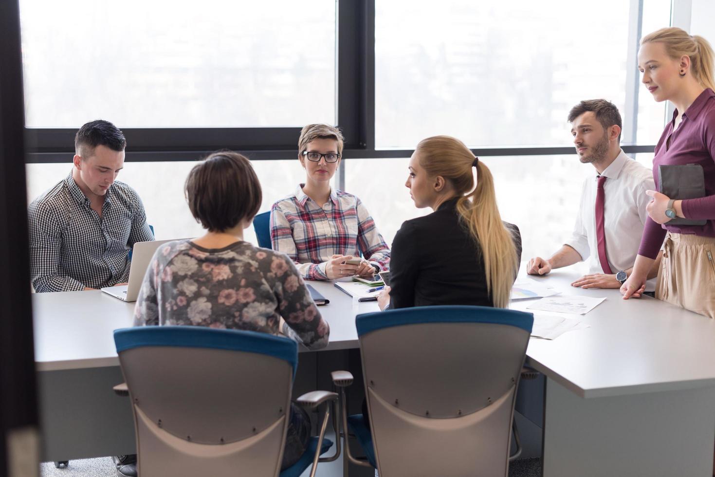 young business people group on meeting at modern office photo