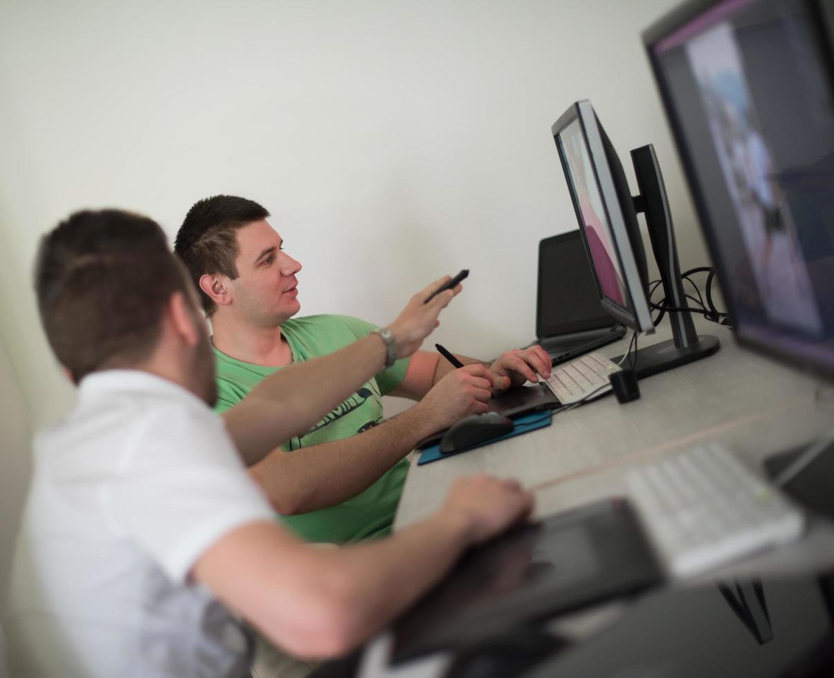 a group of graphic designers at work photo