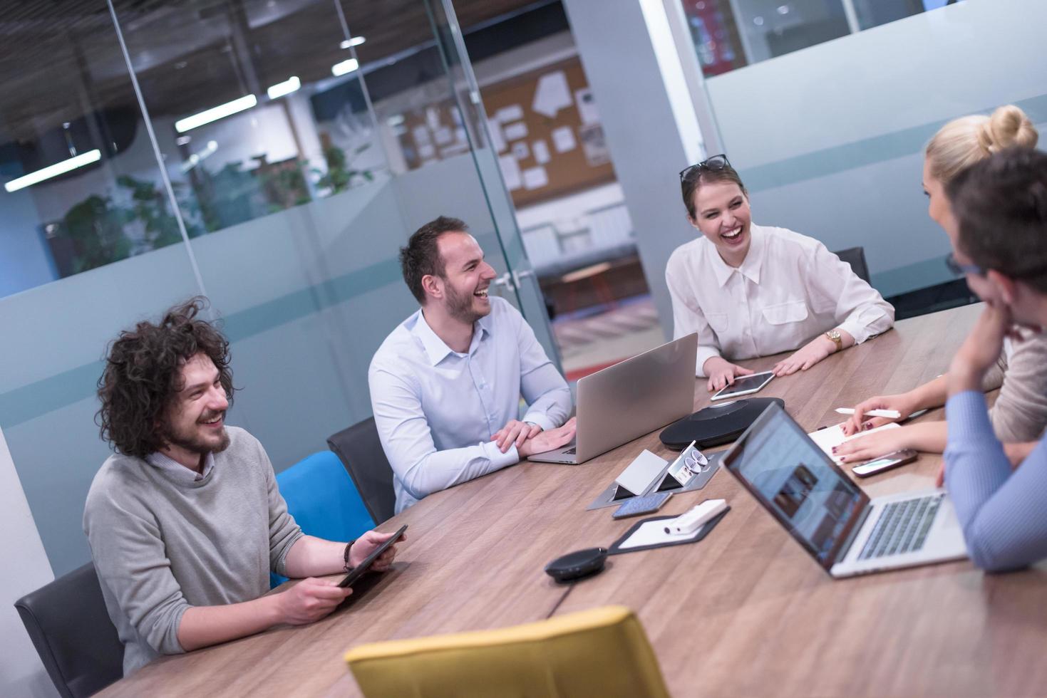 Startup Business Team At A Meeting at modern office building photo