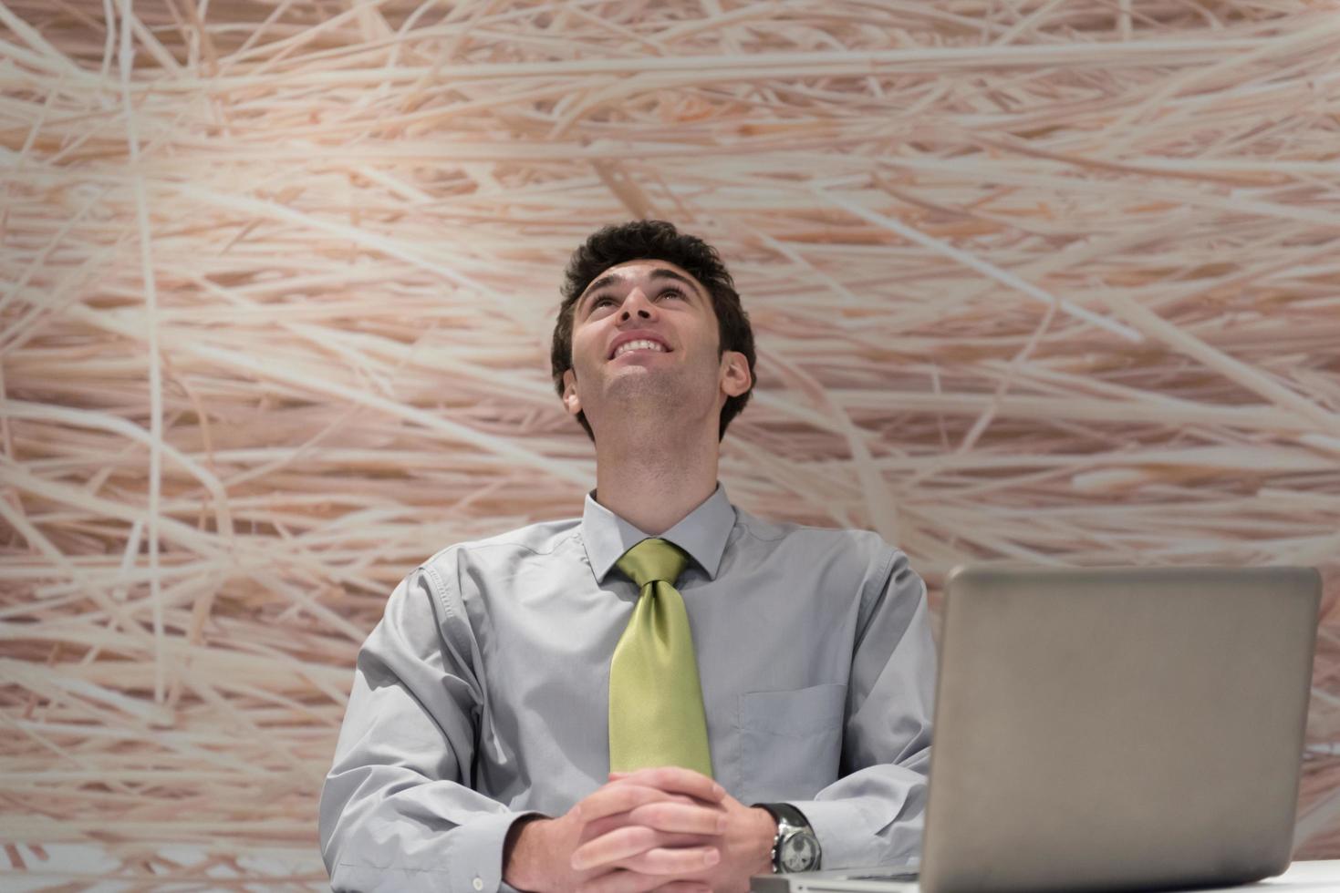 young business man  working on laptop  computer at modern office photo