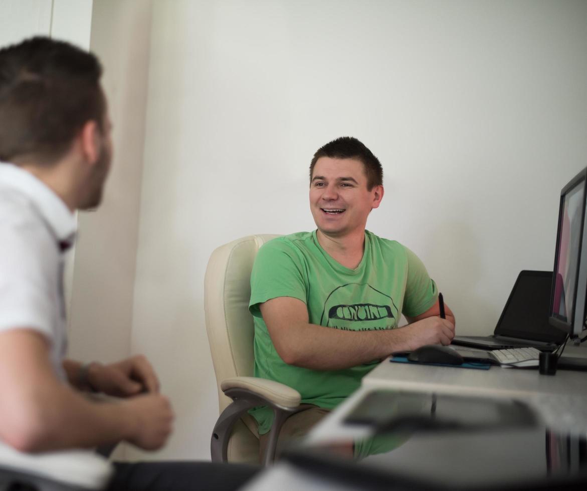 a group of graphic designers at work photo